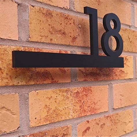 custom house numbers metal black floating on brick wall|brick house numbers chart.